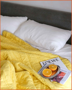 THE QUILTED SLEEPING BAG · LEMON & BUTTER YELLOW ·