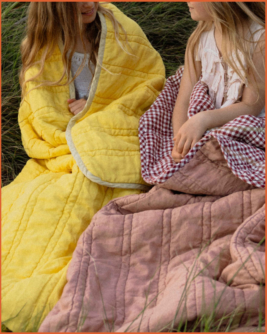 THE QUILTED SLEEPING BAG · LEMON & BUTTER YELLOW ·