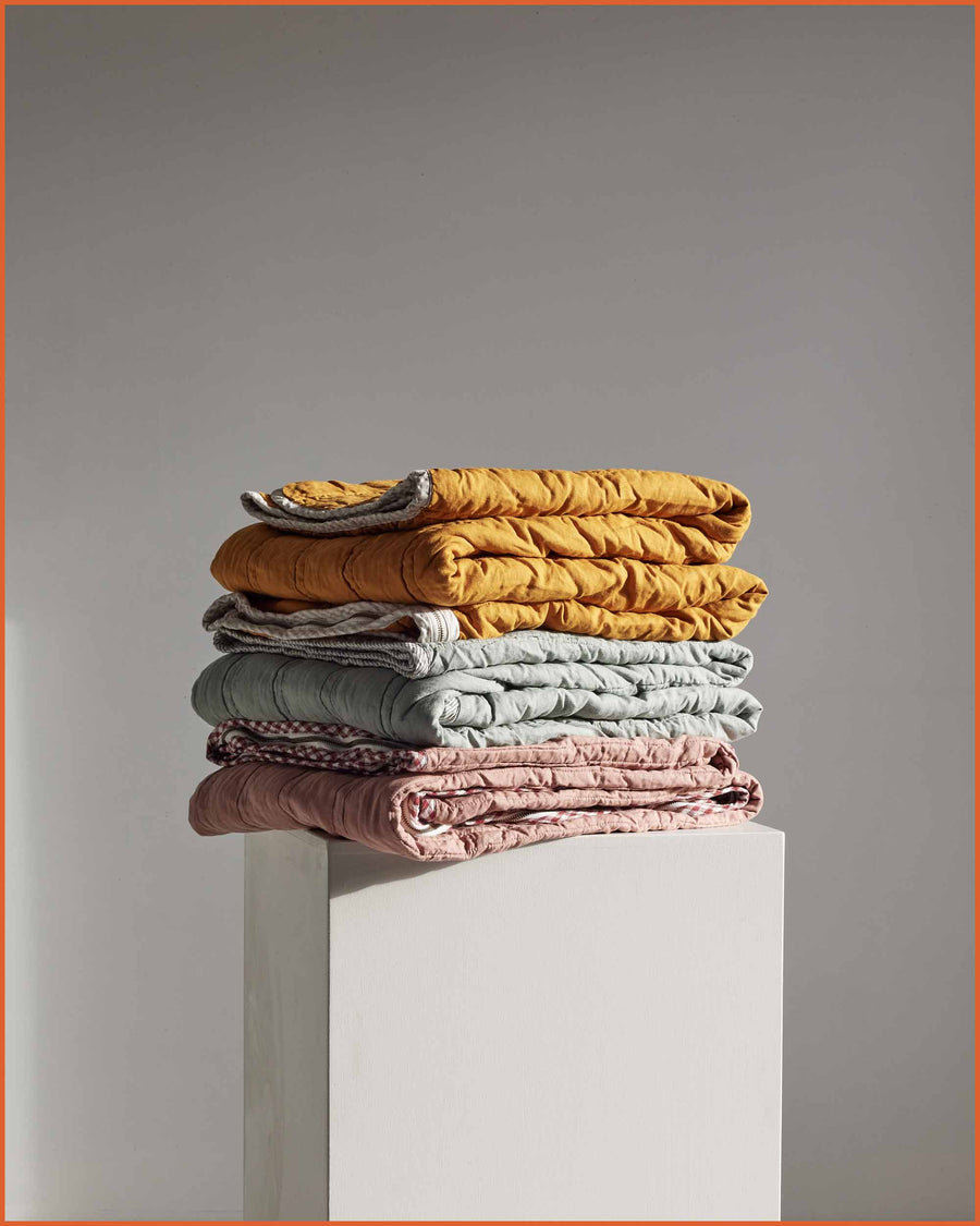 THE QUILTED SLEEPING BAG · SAGE & MINI STRIPE ·