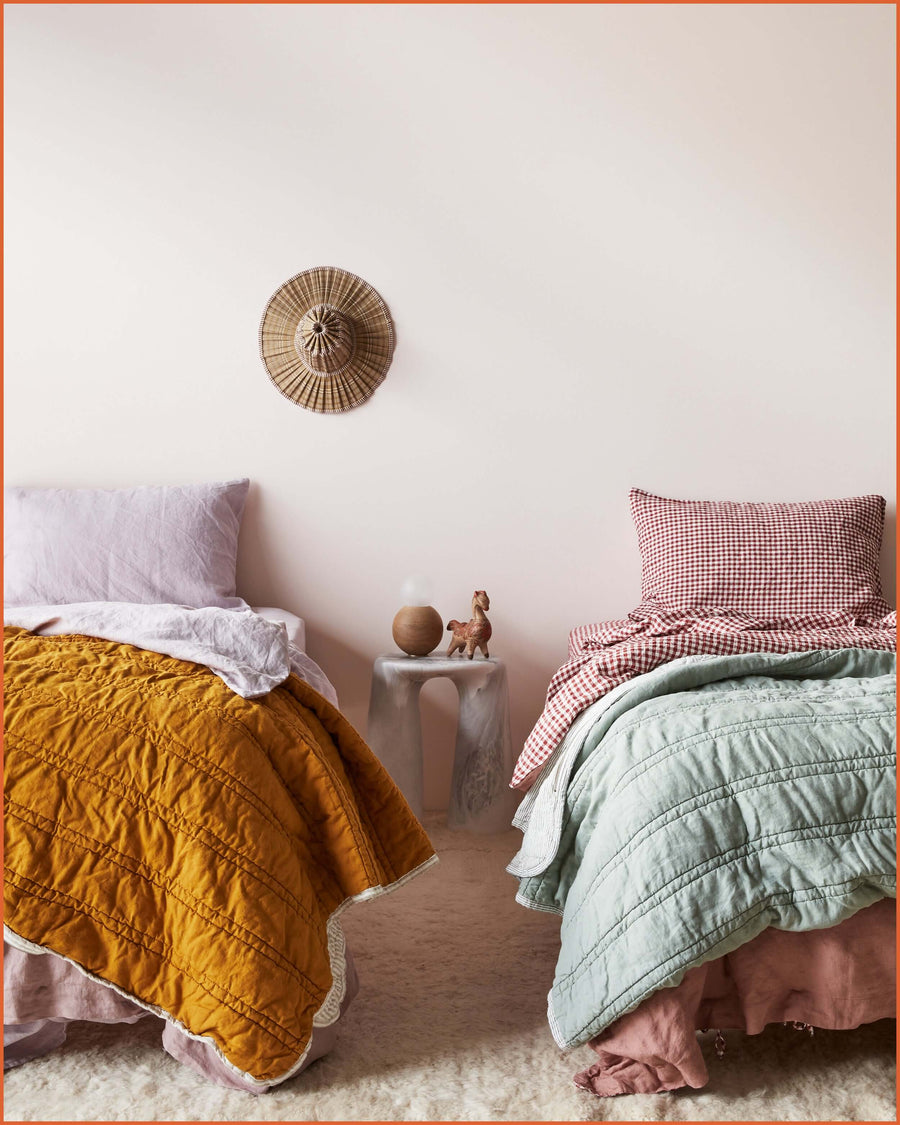 THE QUILTED SLEEPING BAG · SAGE & MINI STRIPE ·