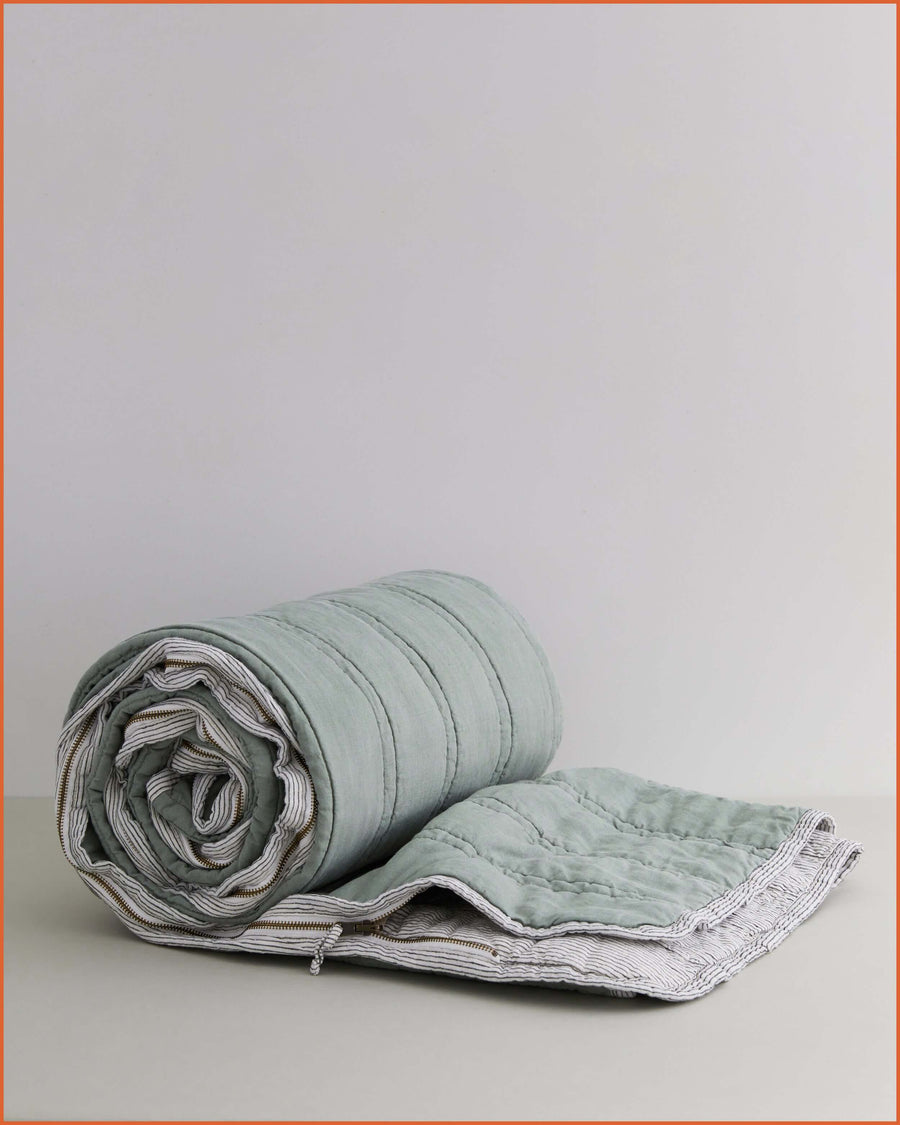 THE QUILTED SLEEPING BAG · SAGE & MINI STRIPE ·